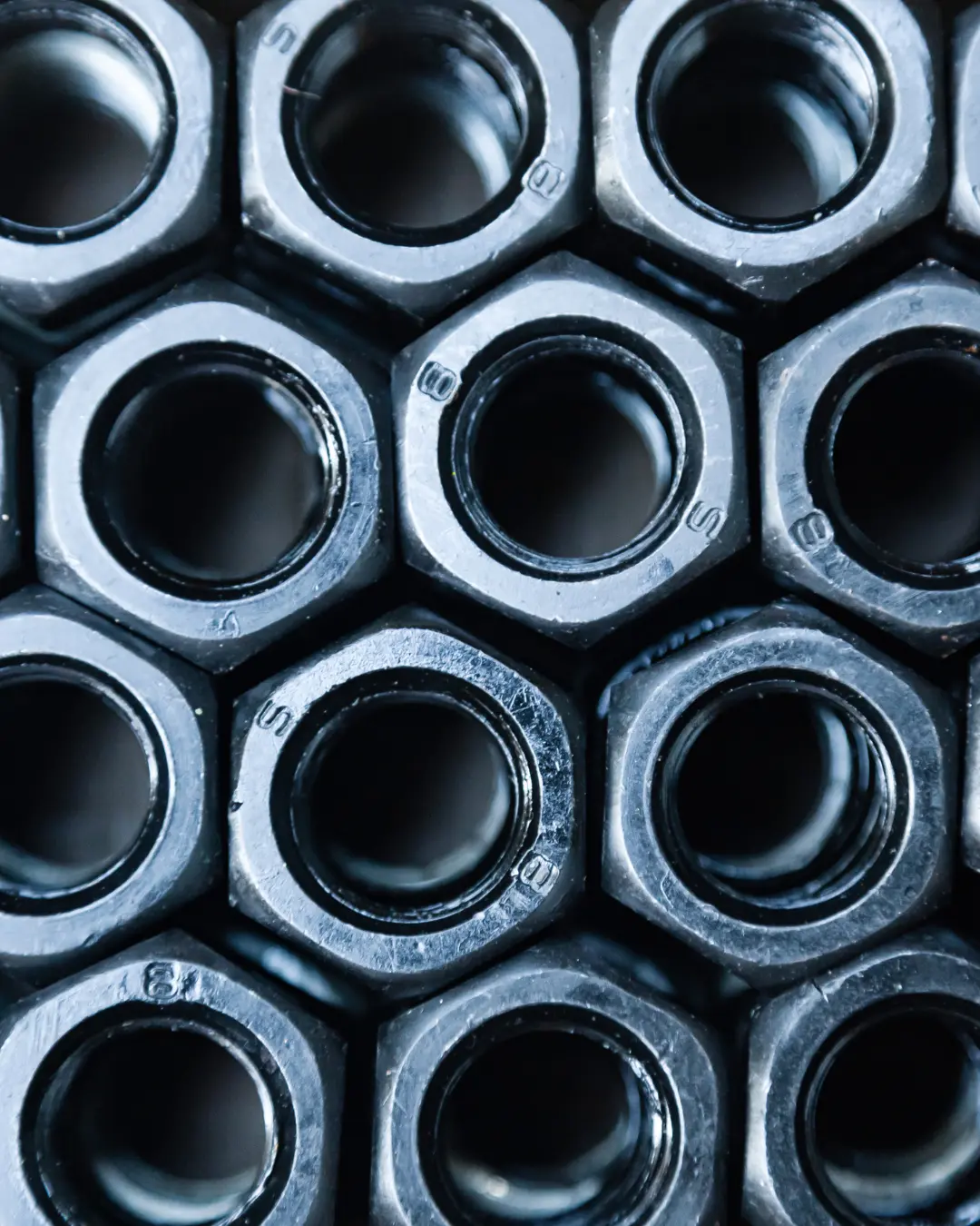 Silver bolts neatly piled on top of one another